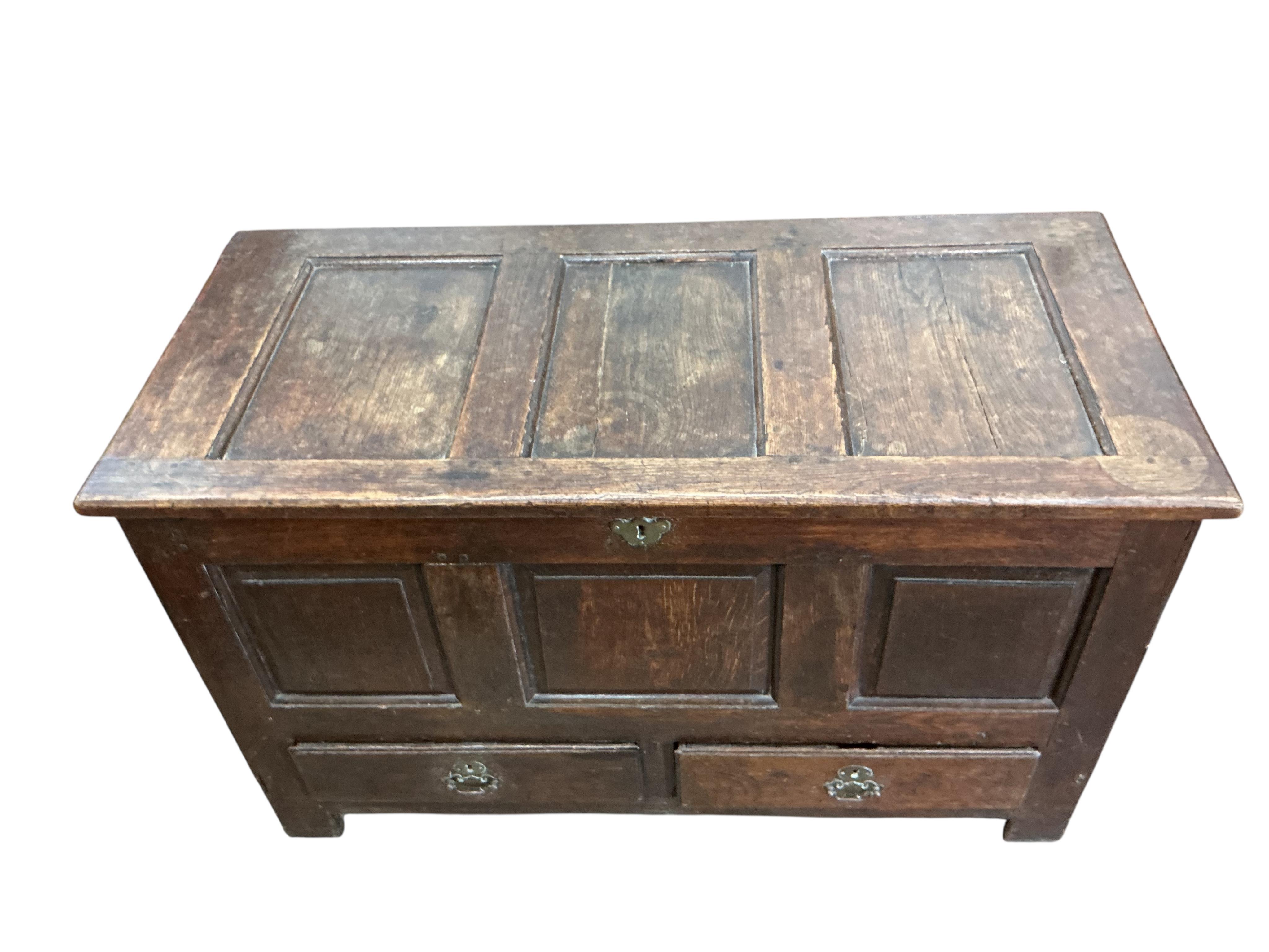 A mid 18th century oak mule chest, width 112cm, depth 51cm, height 67cm
